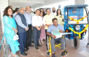 WHEEL CHAIR-USER GAURESH MARATHE SET FOR NEW BEGINNING WITH GIFTED E-RICKSHAW FOOD CART